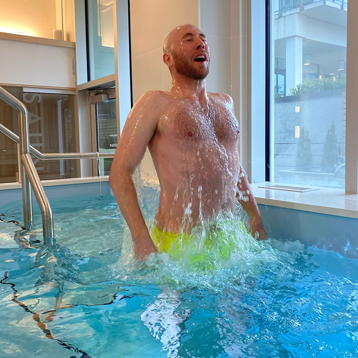 Man reacting from cold water plunge at Ritual Nordic Spa's "Nordic Circuit"